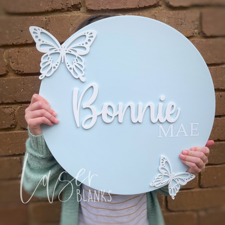 Custom personalised wall plaques made from acrylic, showcasing various designs and colors.